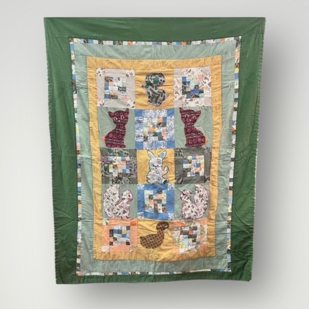 Vintage green patchwork animal quilt